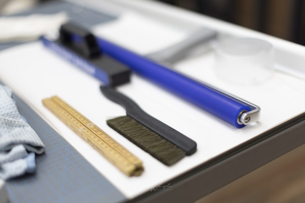 antistatitsche roller en borstel voor het opplakken van foto's